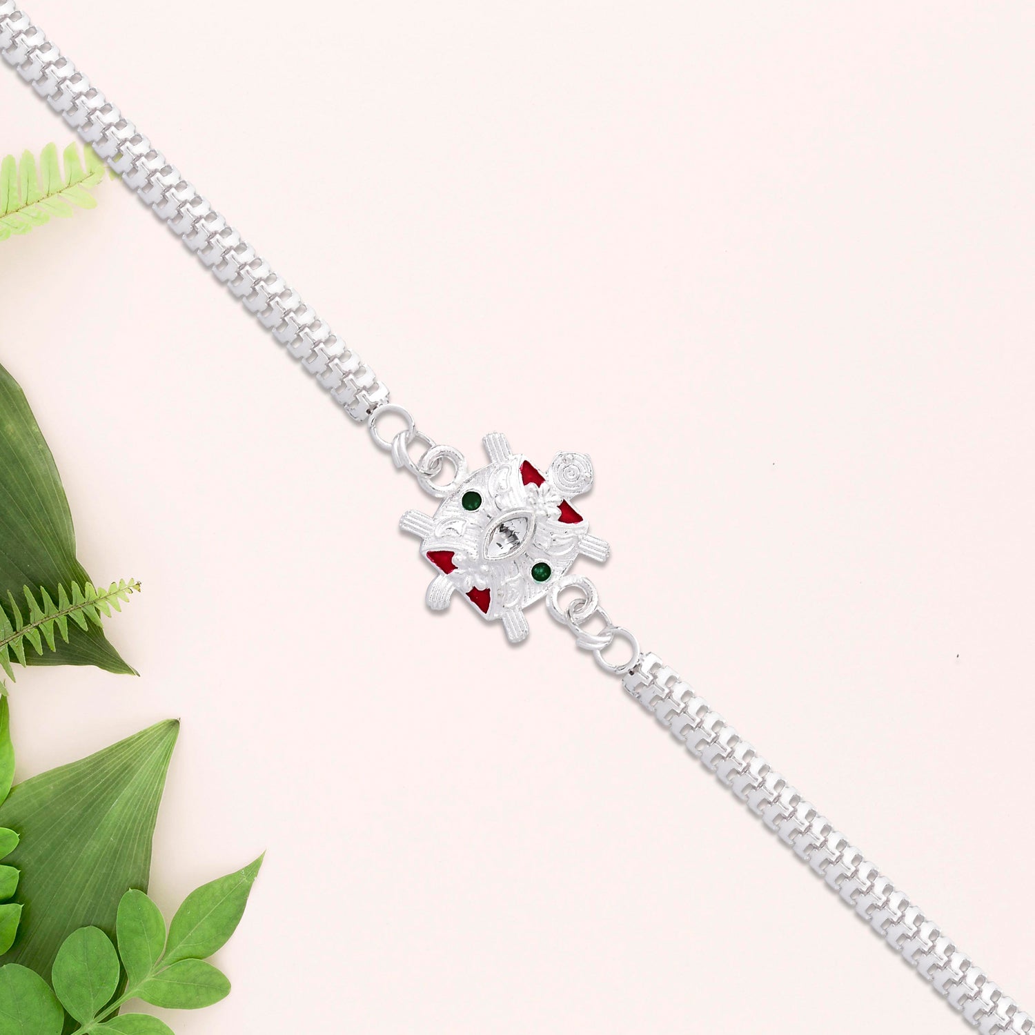 Designer Turtle Rakhi With Silver Finish And Enamel Highlights Designer Turtle Rakhi With Silver Finish And Enamel Highlights
